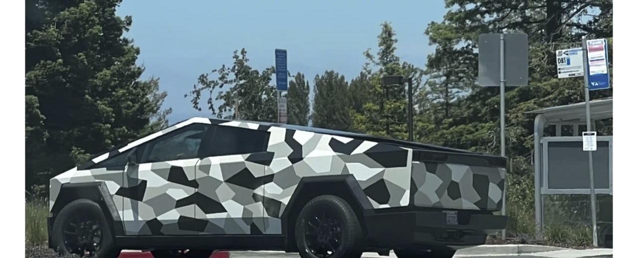 Finalised Tesla Cybertruck spotted sporting round steering wheel, camouflaged outfit