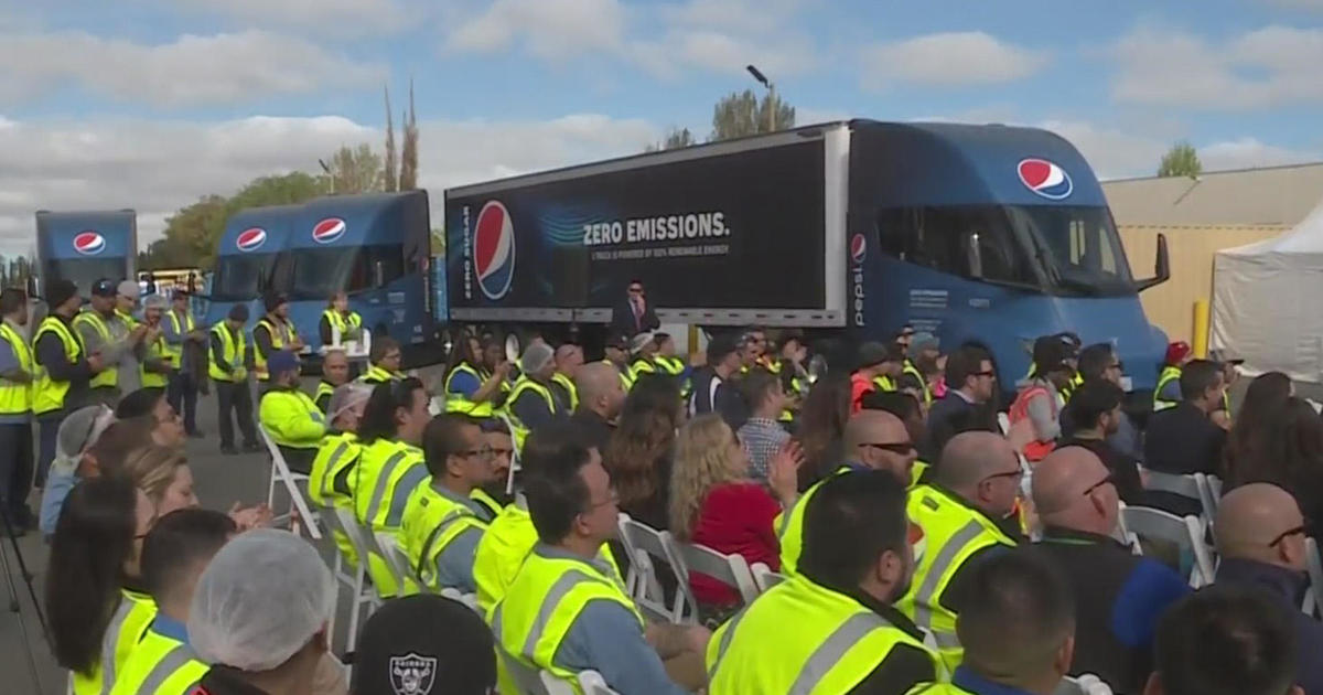 Tesla unveils fleet of more than a dozen electric semi-trucks in Sacramento