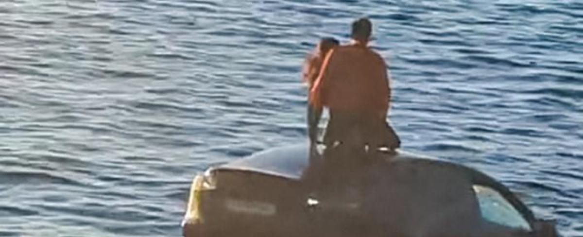 A Tesla plunged into frigid water in Norway. The motorists were rescued by a floating sauna as their car sank.