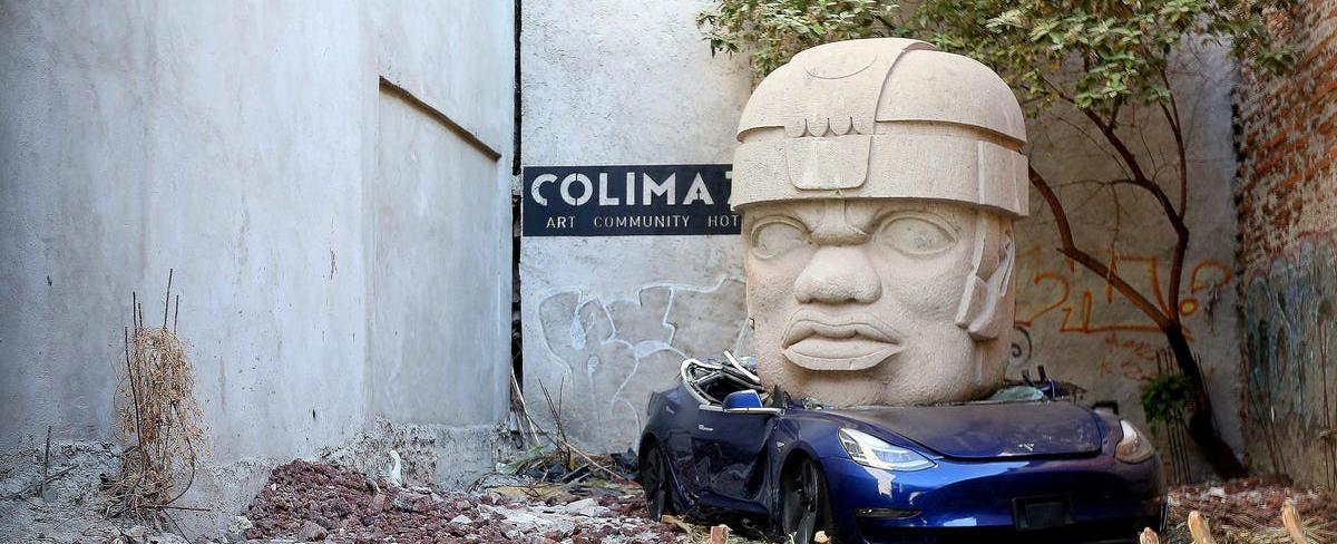 Mexican Artist Crushes Tesla Model 3 Under 9-Ton Statue