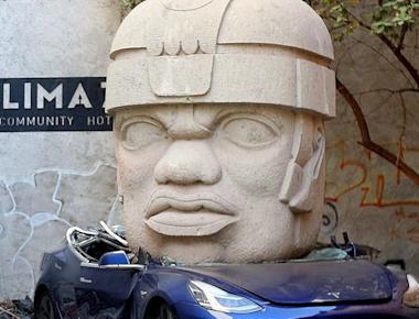 Mexican Artist Crushes Tesla Model 3 Under 9-Ton Statue