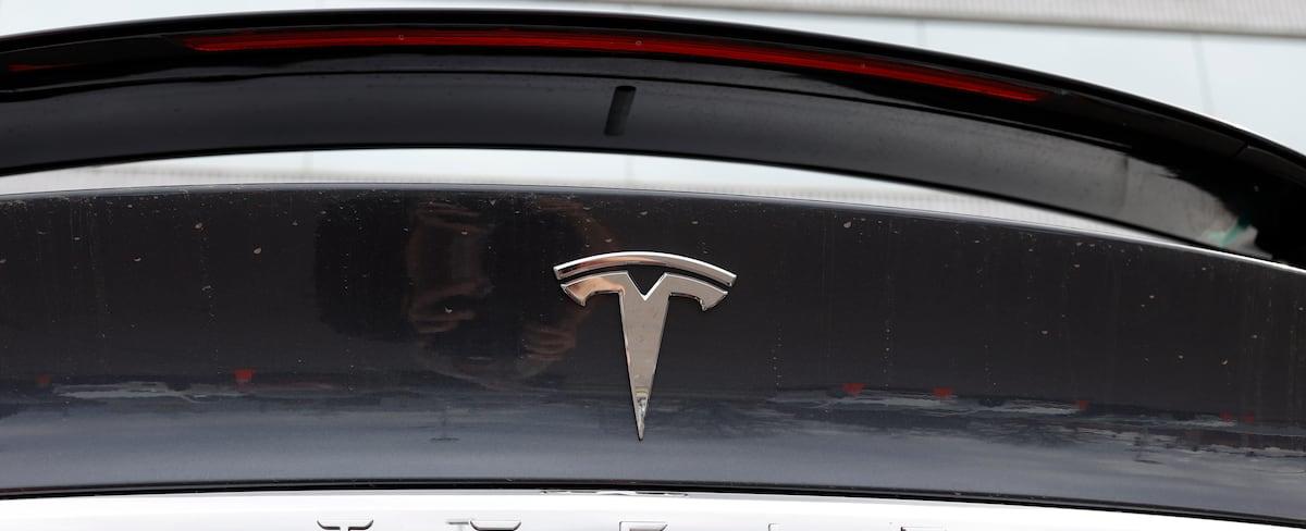 Tesla recalls more than 120,000 cars whose doors may open in crash