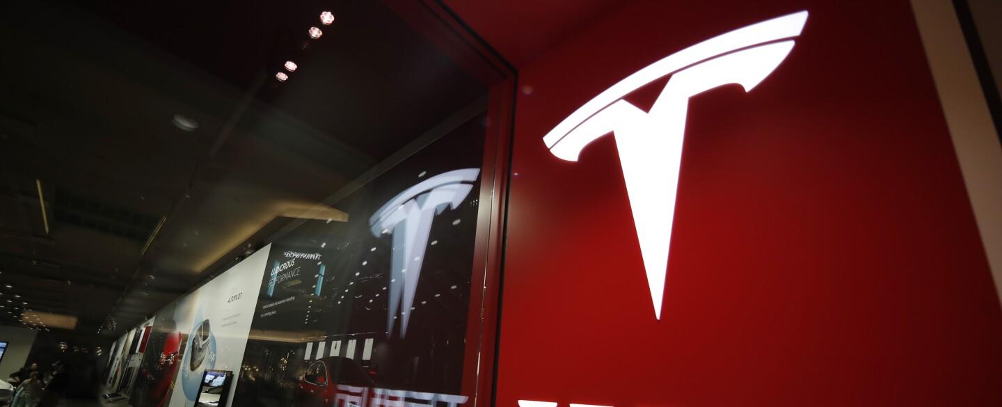 Tesla shares tumble below $150 per share, giving up all gains made over the past year