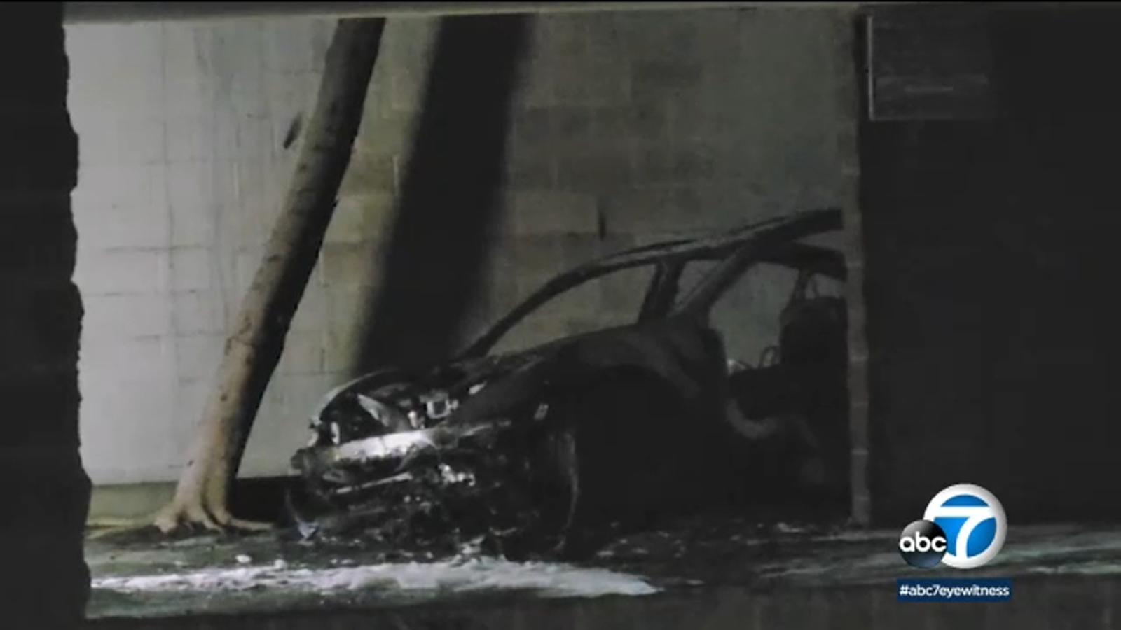 Tesla fire in Valley Village leads to LAPD finding burned body nearby; cause still under investigation