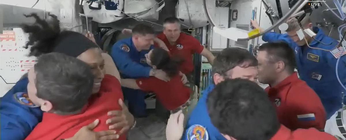 Crew Dragon docks with space station, bringing four fresh crew members to the outpost