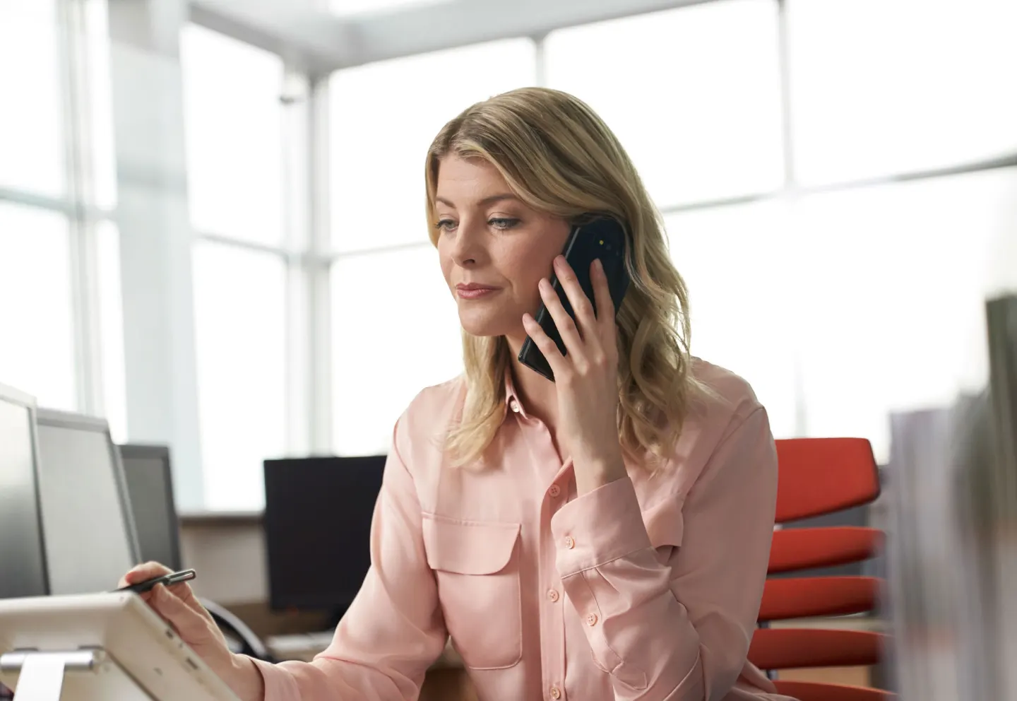 Business woman using phone