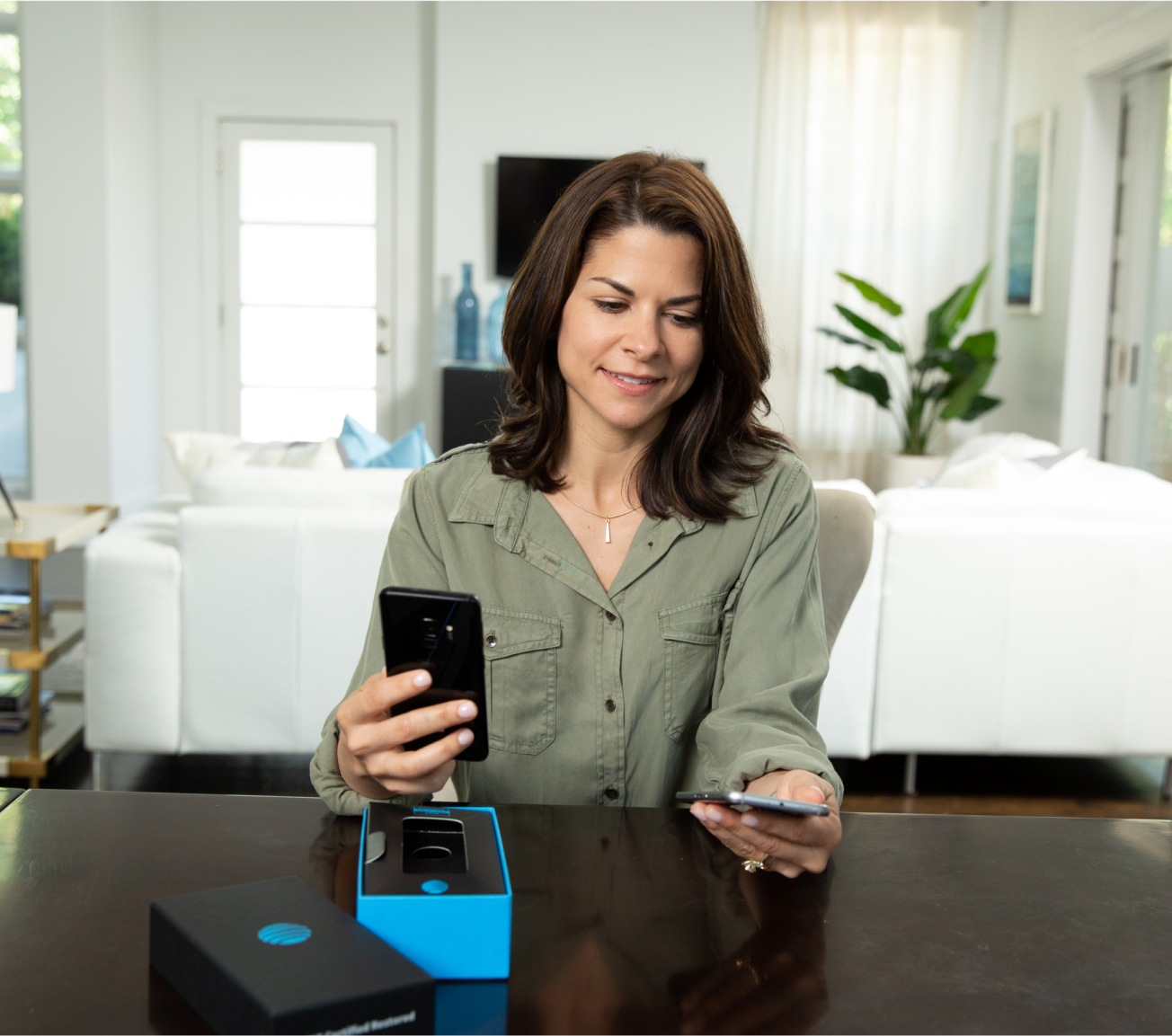 Woman pairing a device with her phone