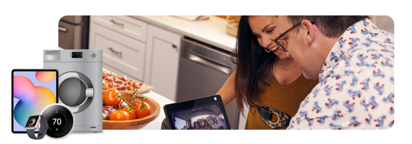 Couple looking at doorbell camera