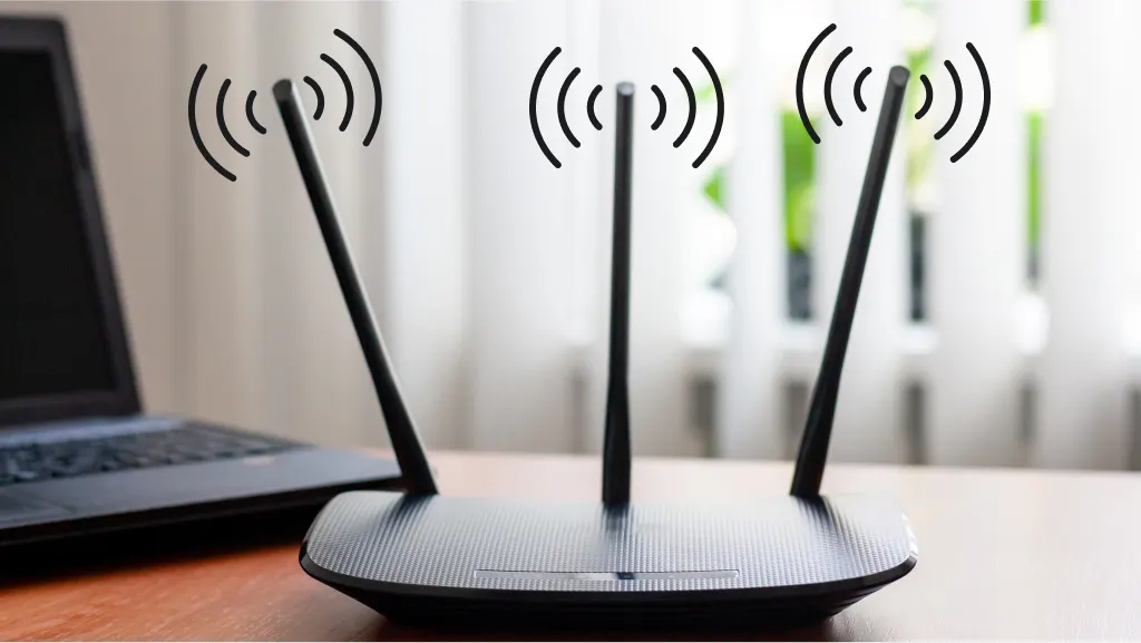 Computer beside router with illustration of wifi signal.