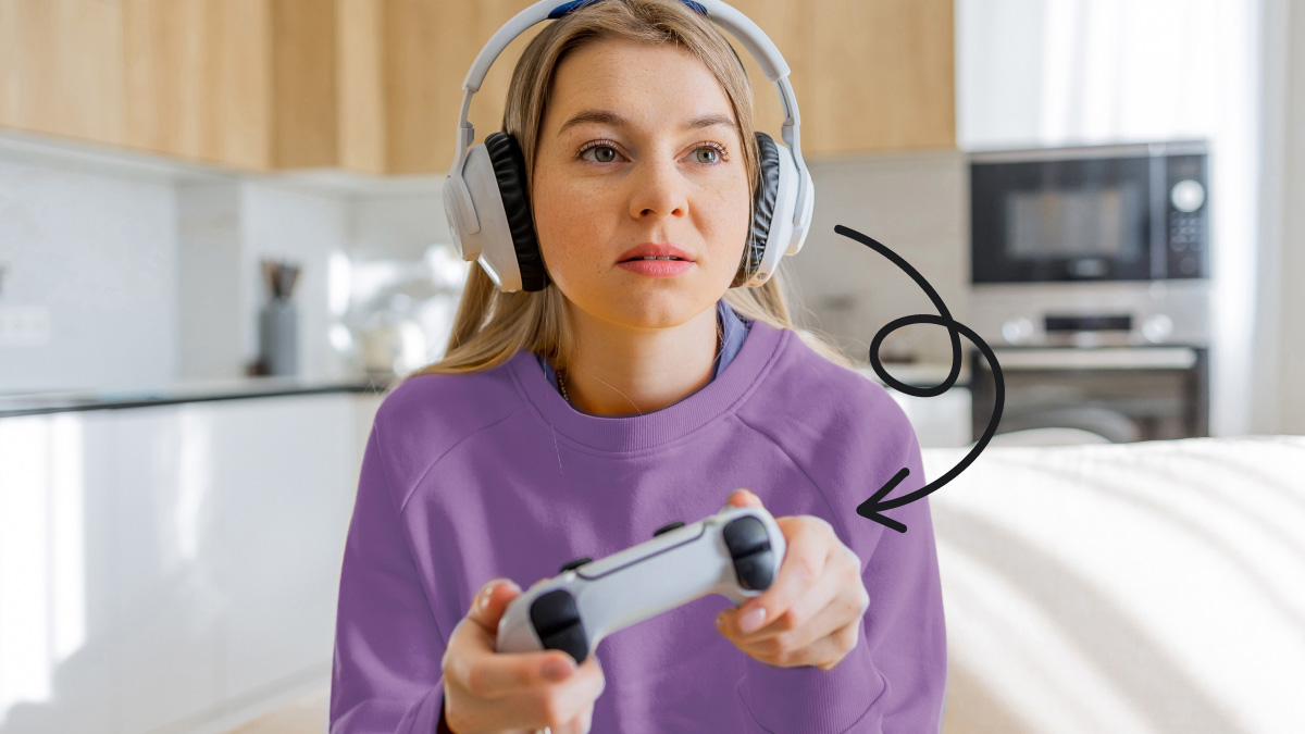 Woman connecting Bluetooth headphones to PS5