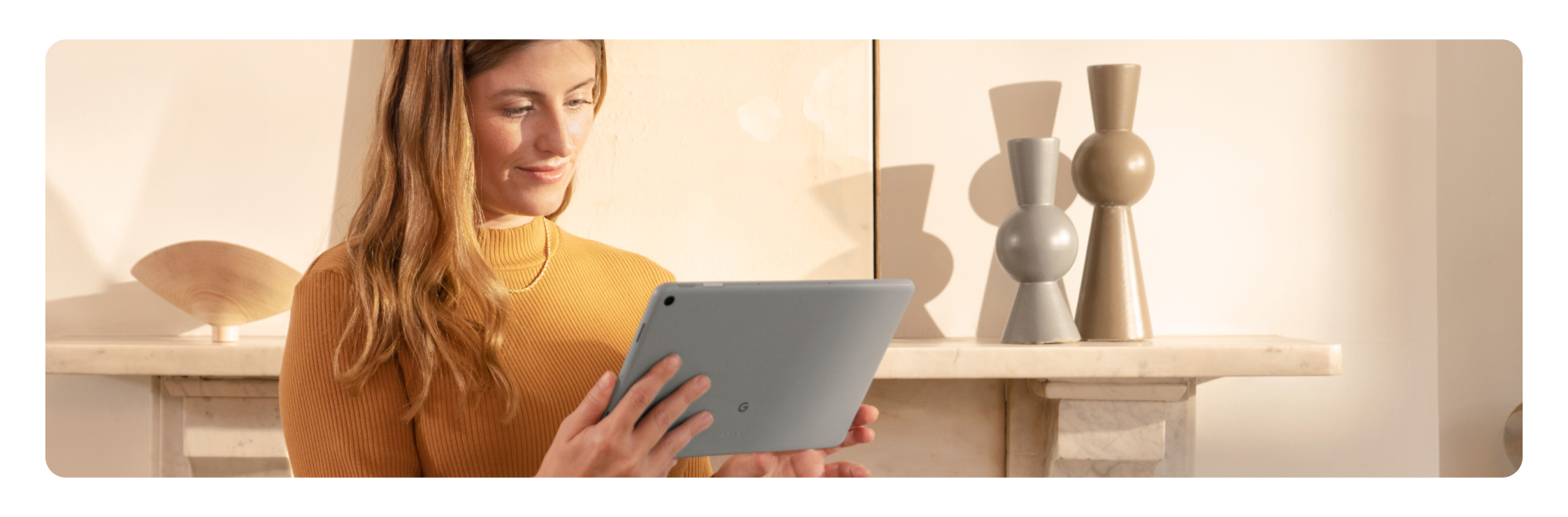 woman holding tablet