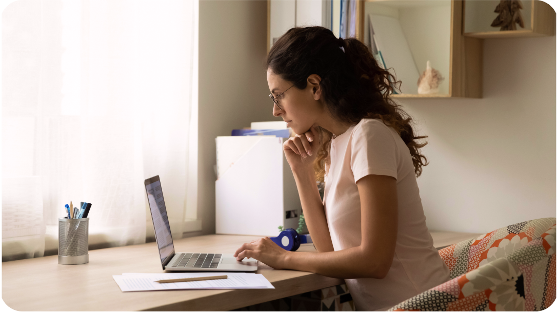 Woman on laptop at a desk