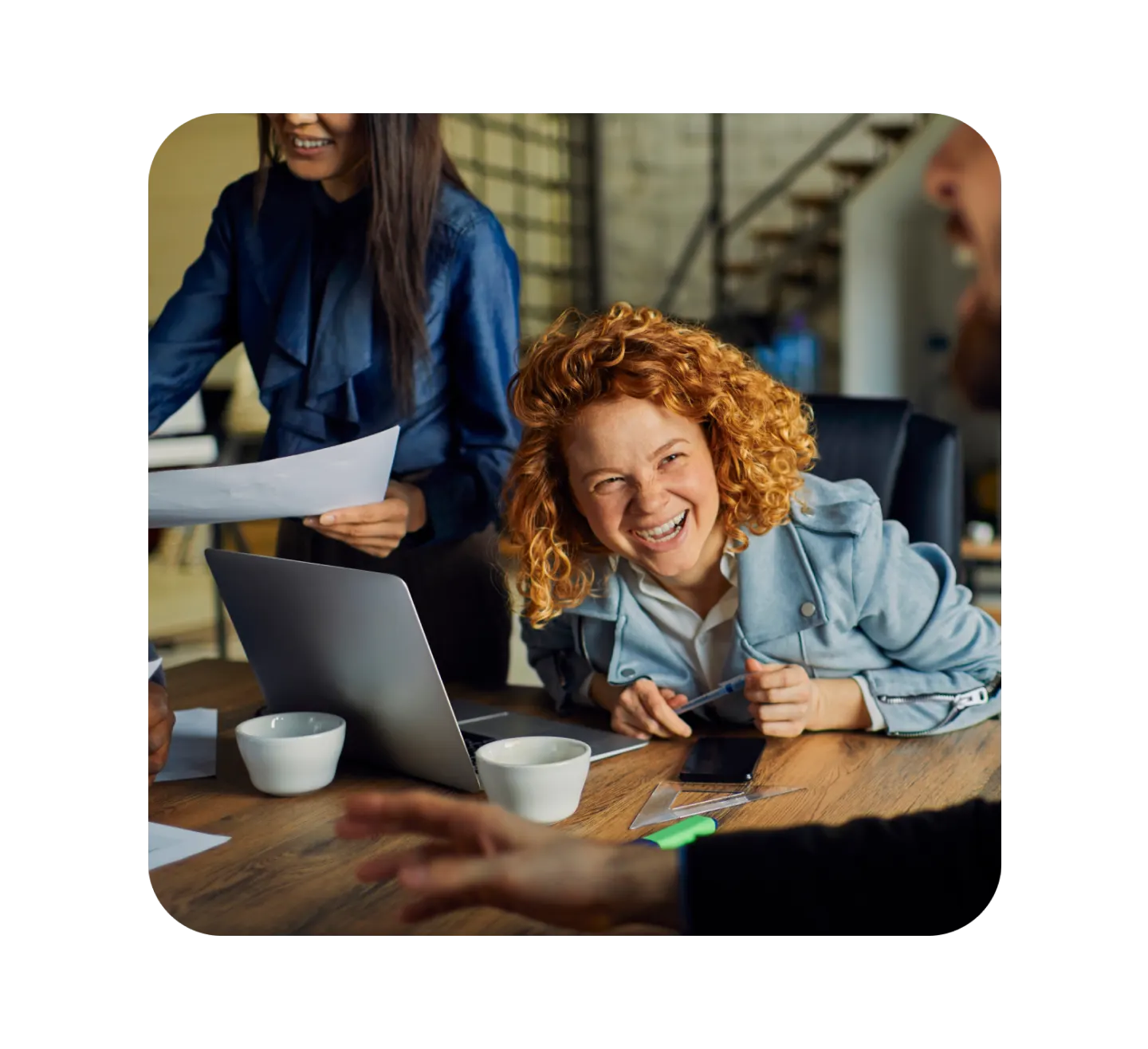 smiling woman with laptop
