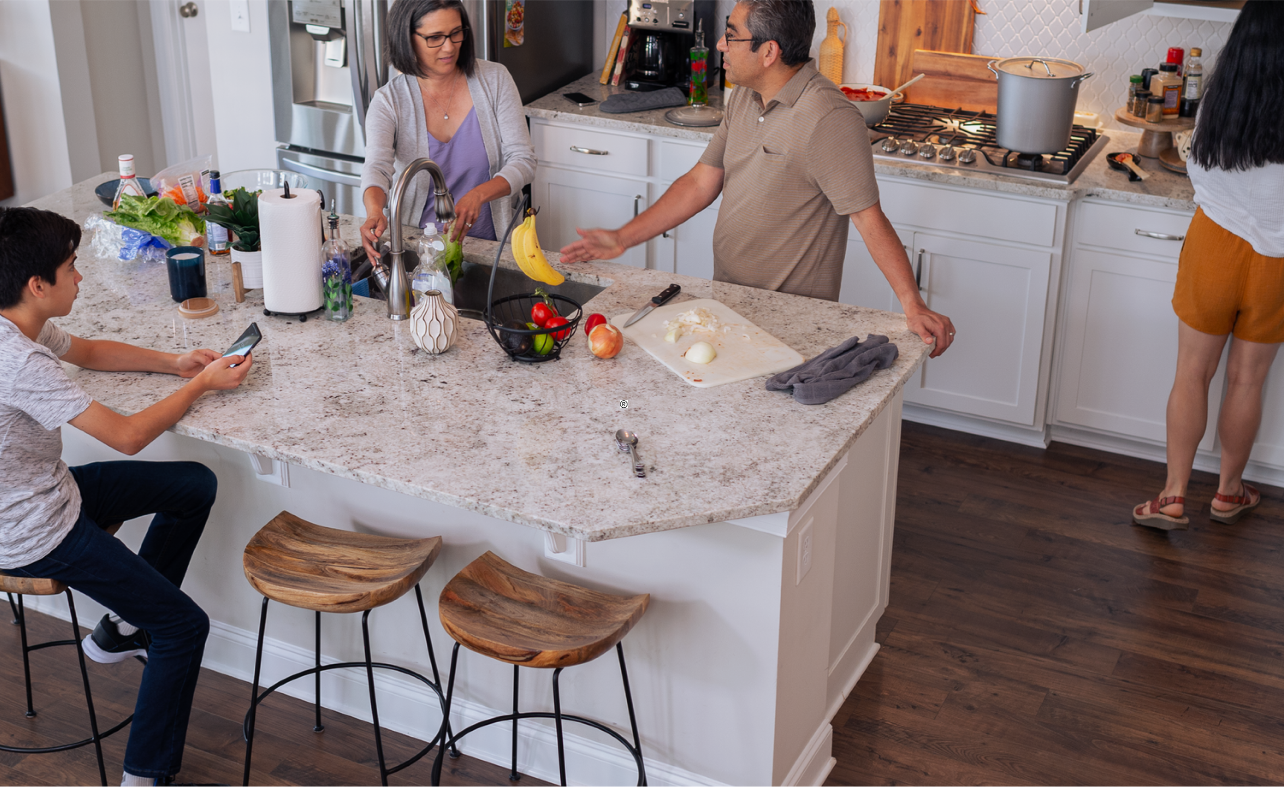 Family gathered in kitchen