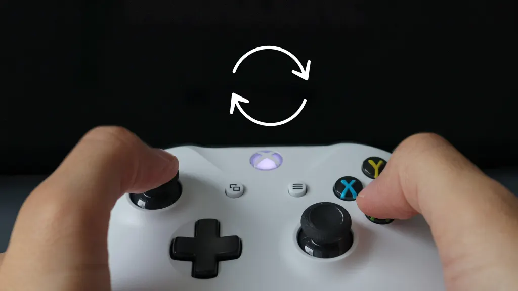 Person using Xbox controller to the reset system