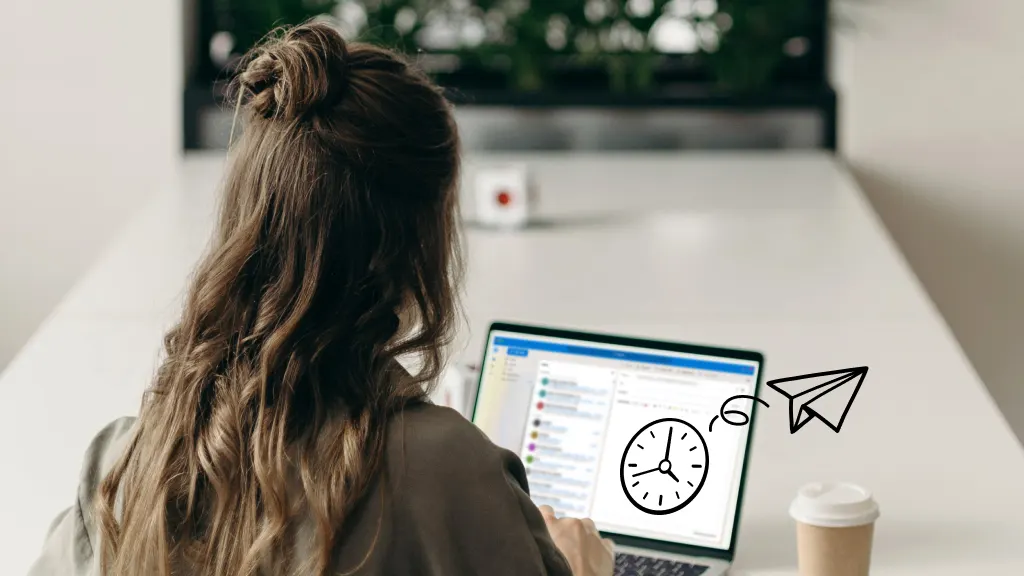 Woman scheduling an email in Outlook