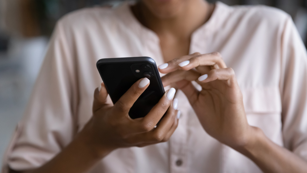 Woman using iPhone