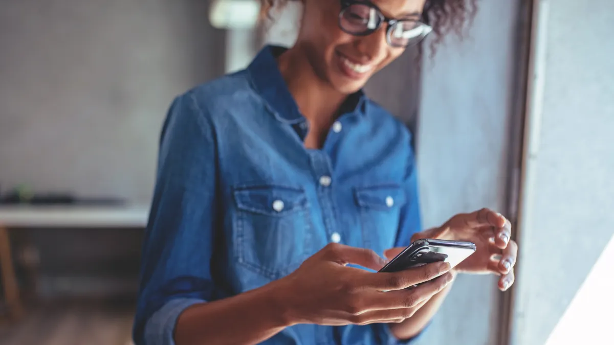 Woman considering AT&T Protect Advantage for phone protection