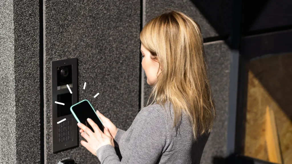 Woman using smart door lock