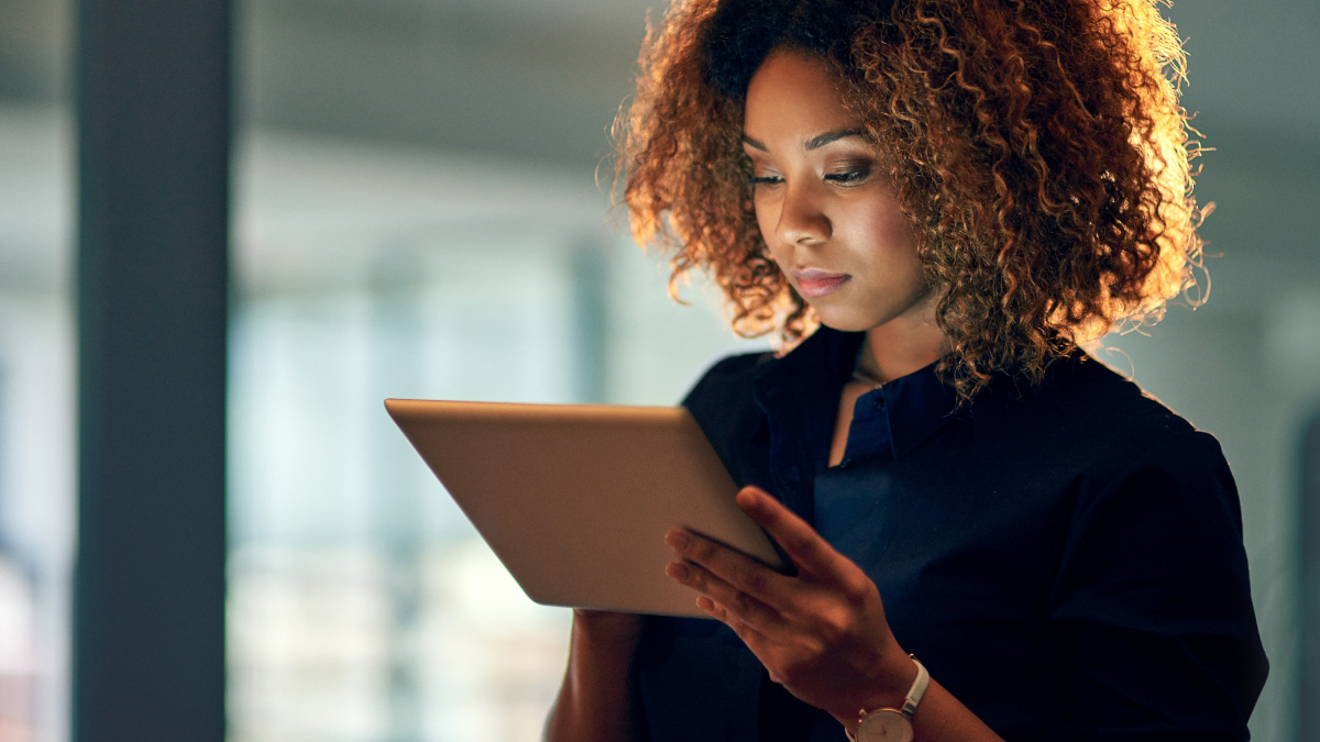 Woman looking at iPad in recovery mode
