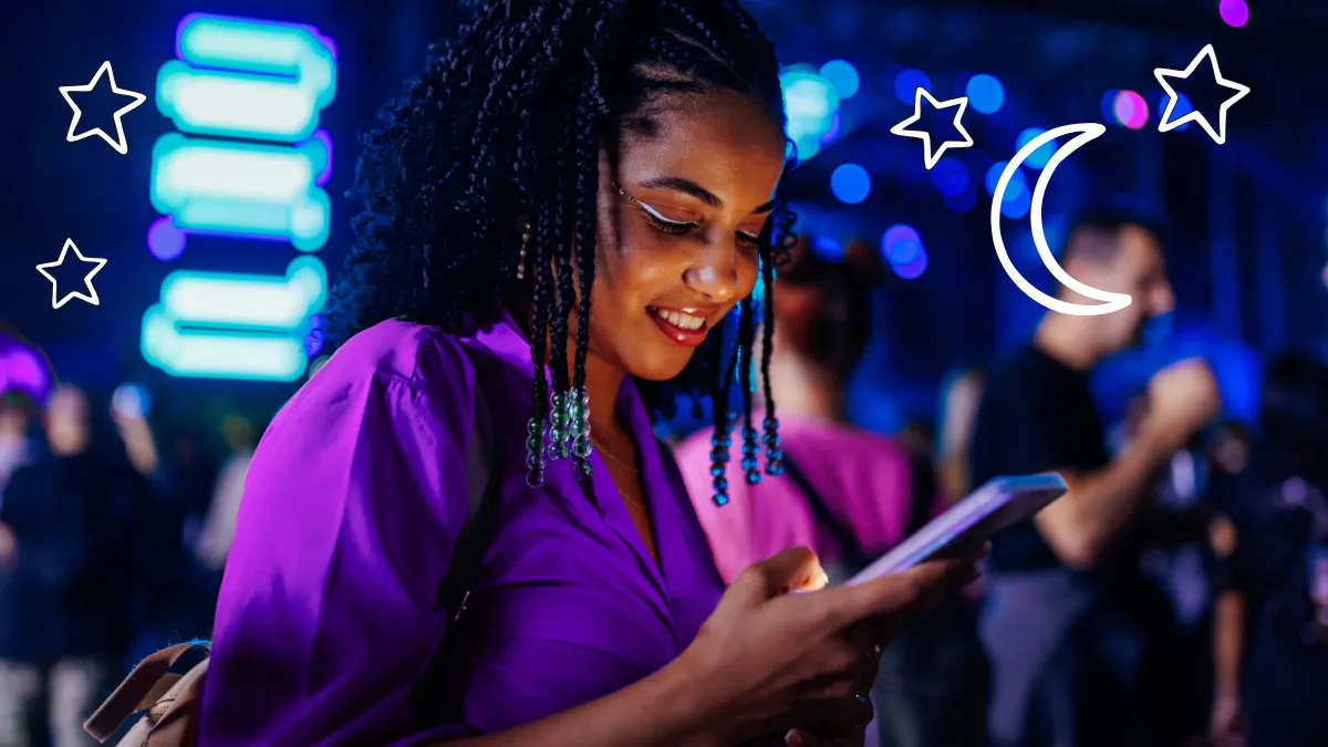 Woman turning on dark mode on iPhone