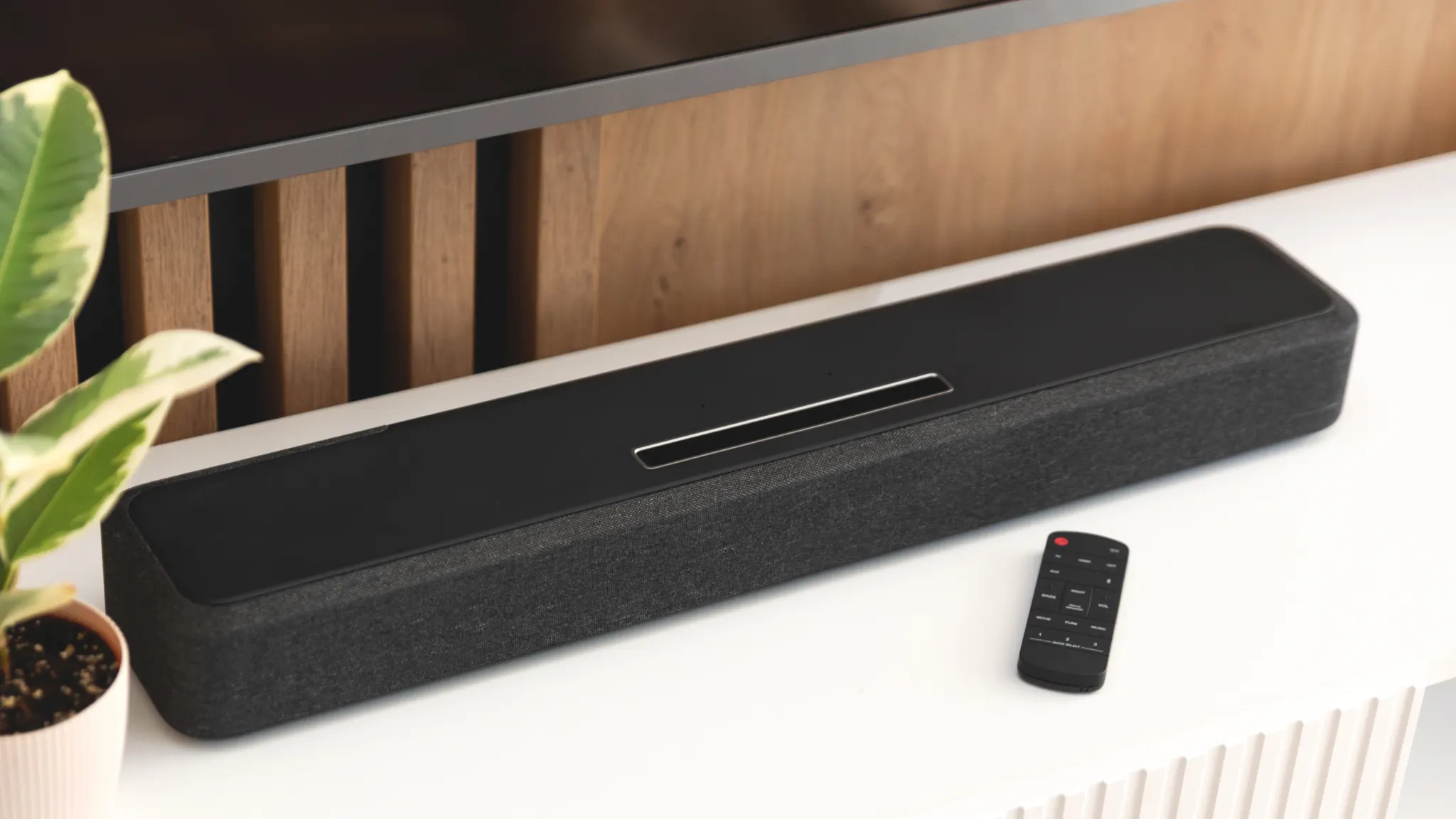 Soundbar connected to TV with HDMI ARC, illustrating how to fix no sound issues and restore audio output