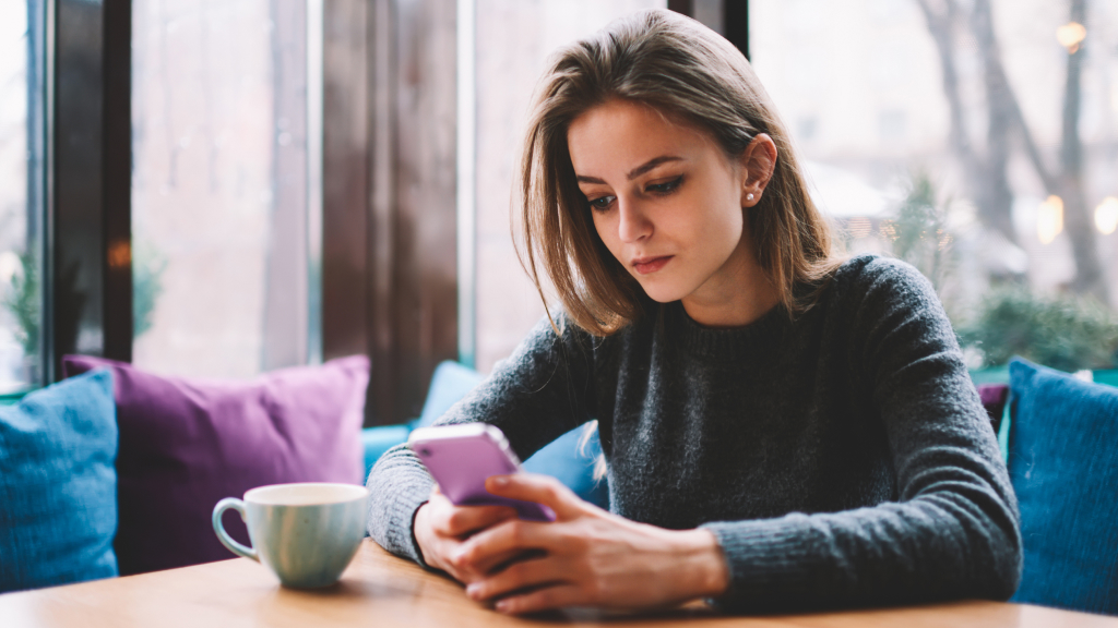 Woman using iPhone