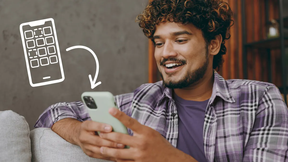 Man customizing iPhone home screen
