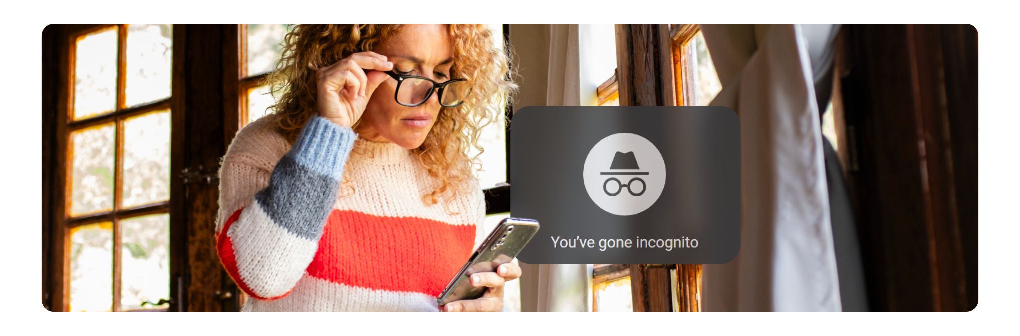 Woman looking at phone incognito mode