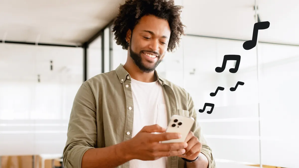 Man changing ringtone on iPhone