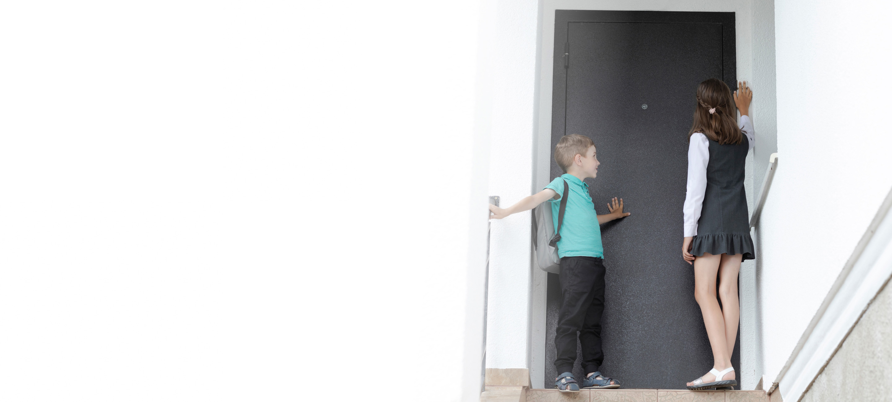 Children ringing doorbell