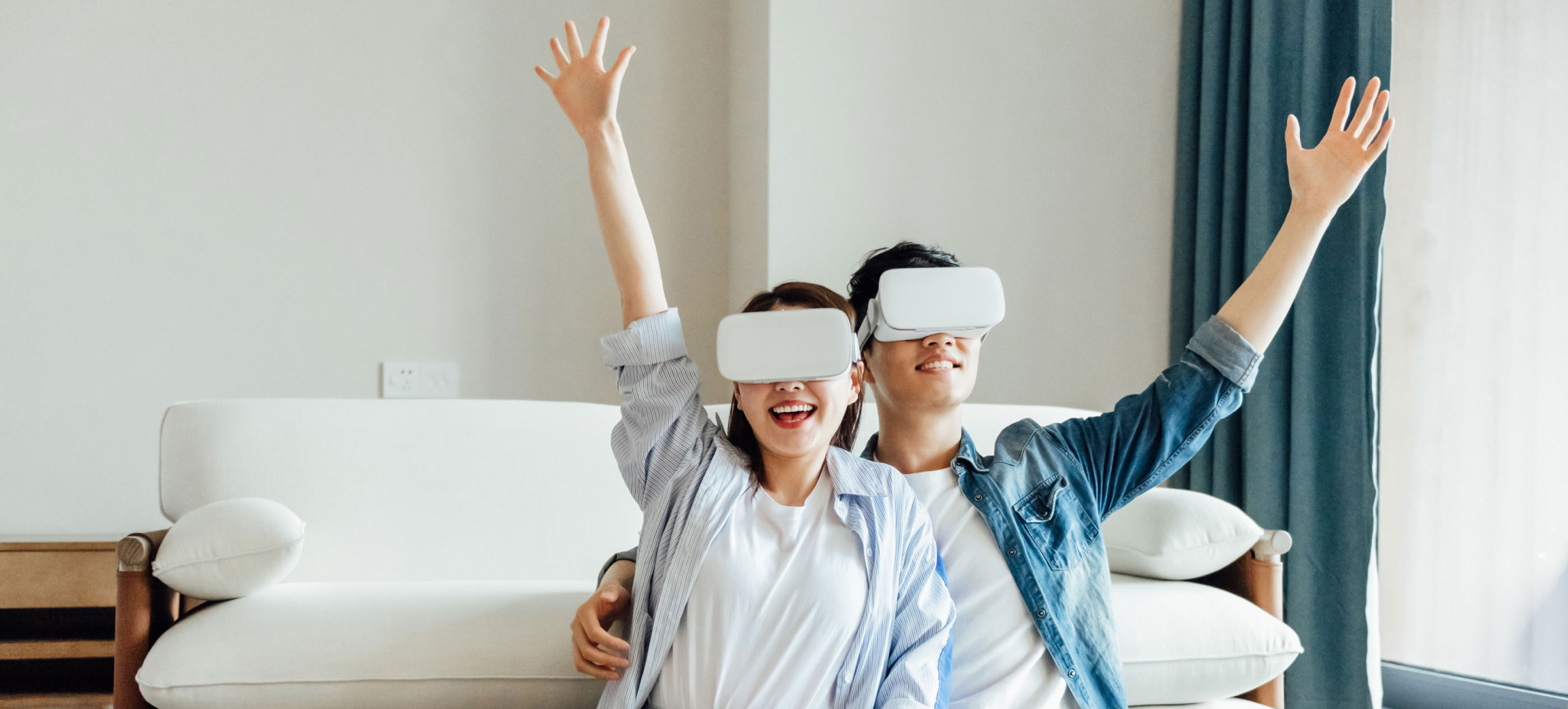 a couple wearing VR headsets
