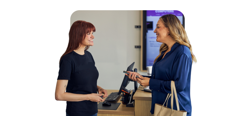 Employee helping a customer