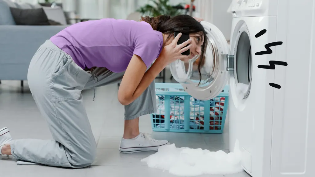 Woman looking in dryer