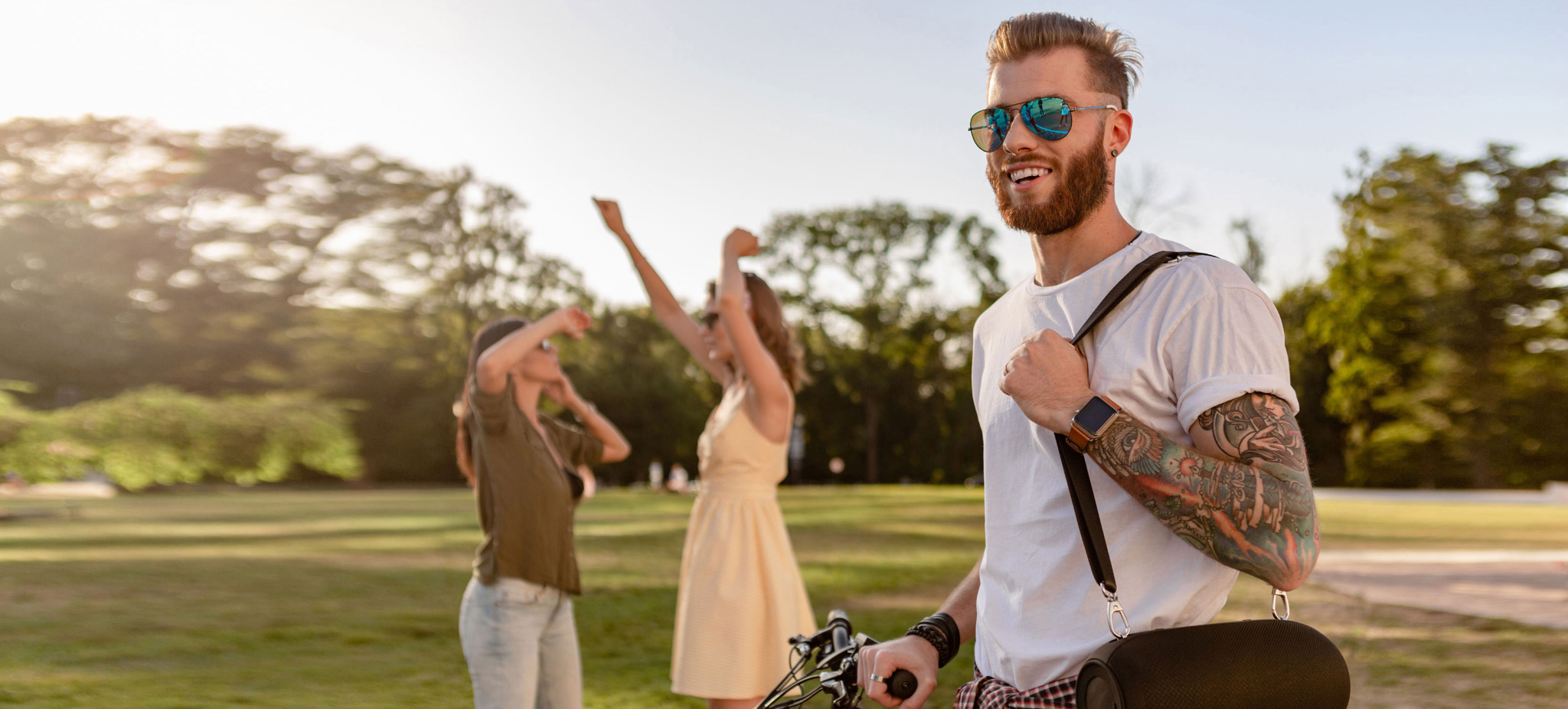 man takes a Bluetooth speaker to park