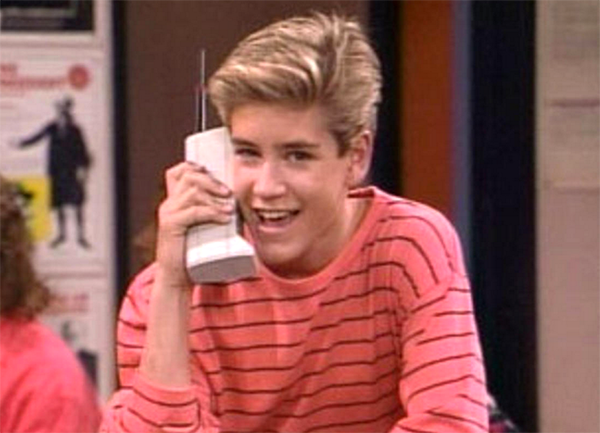 Screenshot from Saved by the Bell of Zack Morris holding his infamous phone