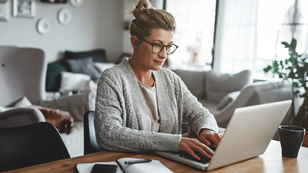 Woman restarting her Lenovo laptop