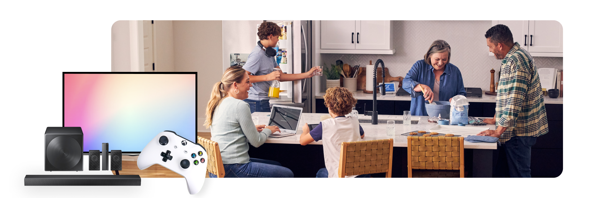 Family around the kitchen island using their devices