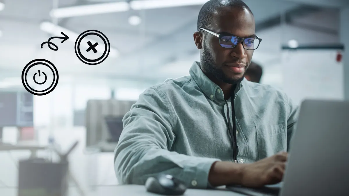 Man working on laptop to stop apps from opening on startup