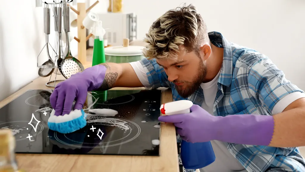 Woman cleaning glass stove top safely