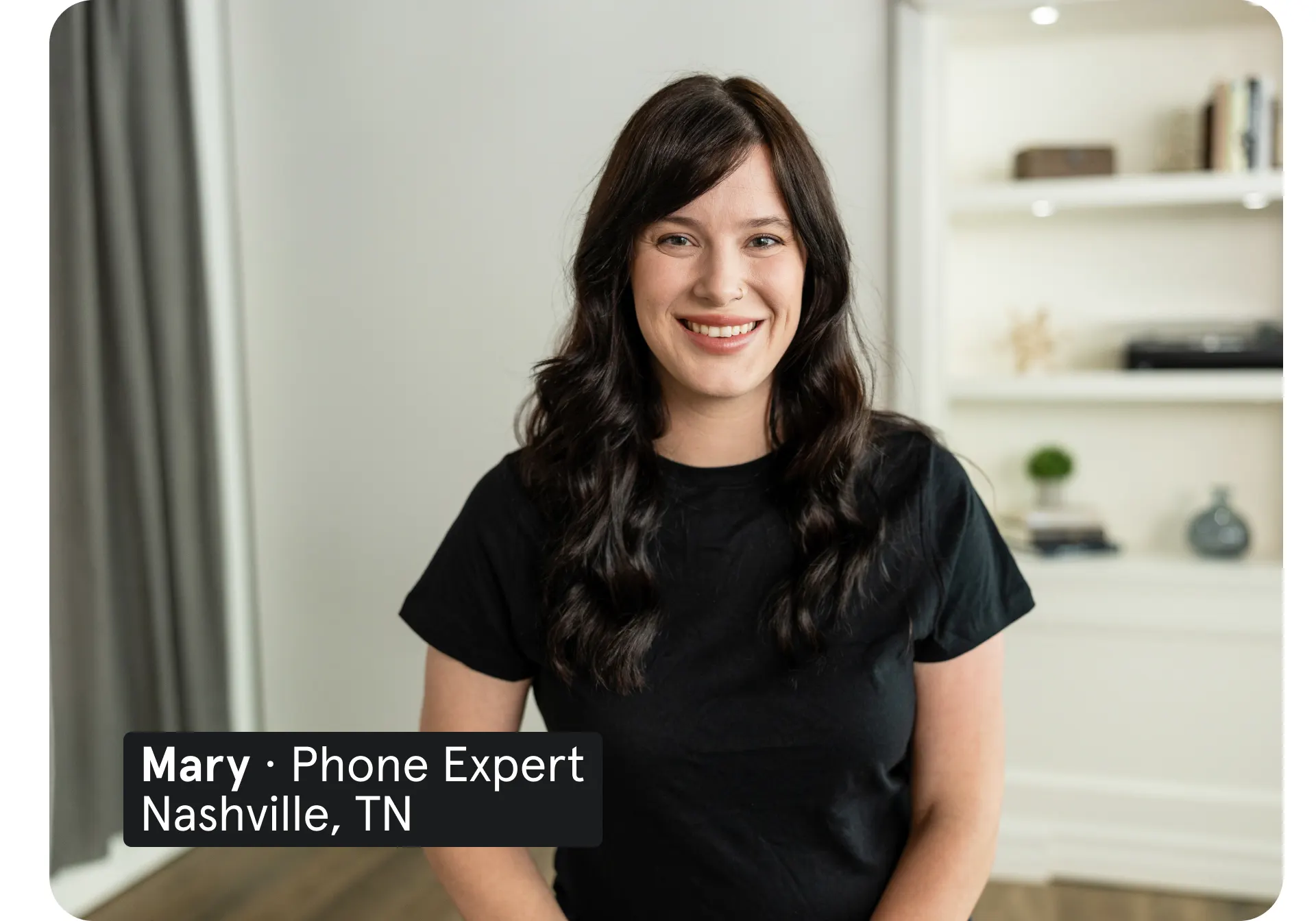 An image of an Asurion Expert named Maria, who specializes in phone care, smiling.