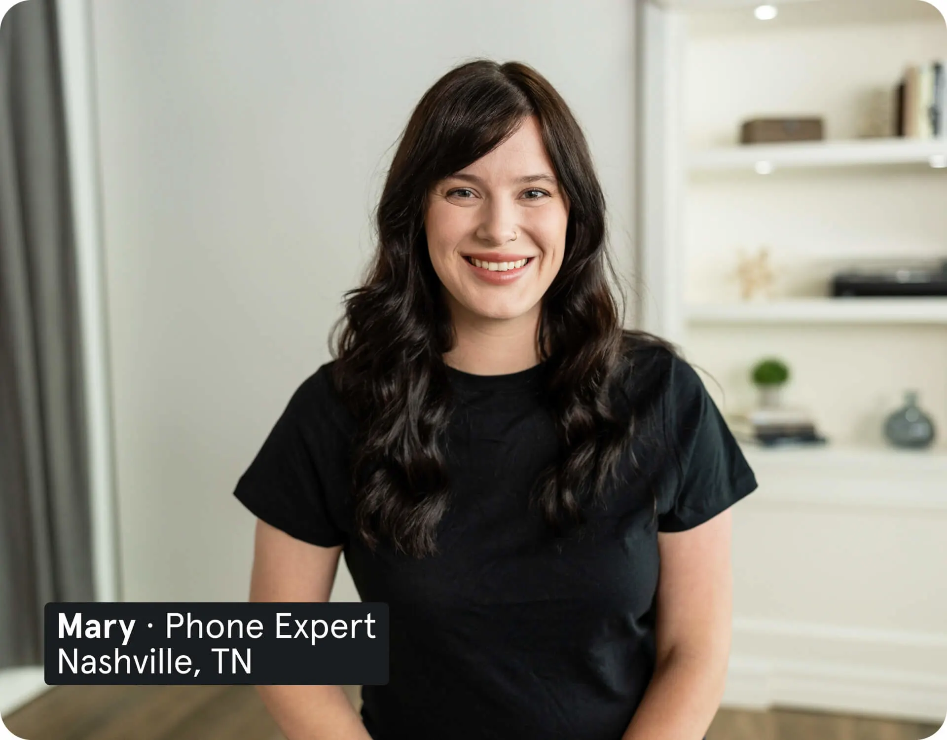 An image of an Asurion Expert named Maria, who specializes in phone care, smiling.