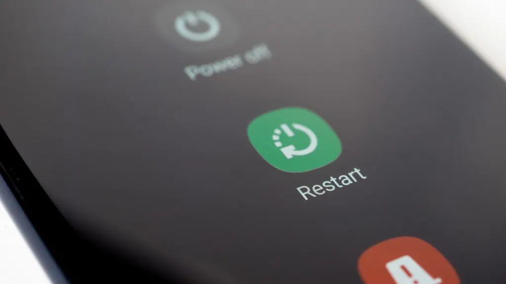 Close up of a smartphone screen showing the restart function
