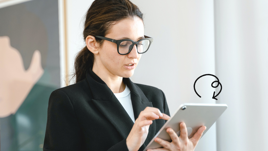 Woman holding iPad with screen that's not rotating