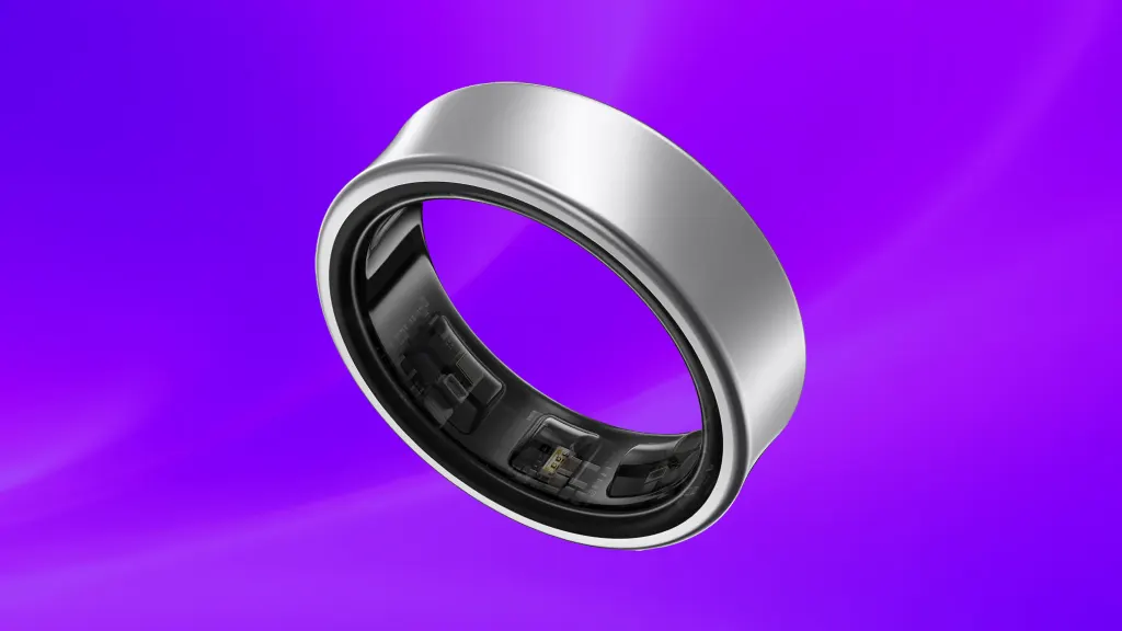 Isolated product image of a silver Galaxy Ring on a purple background