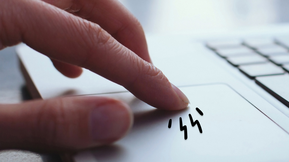 Person enabling or disabling the touchpad on laptop