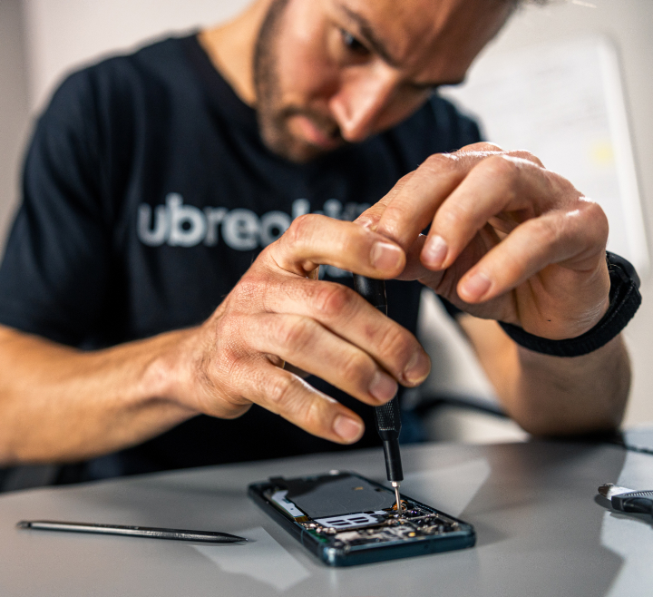 uBreakiFix by Asurion expert repairing an Android phone