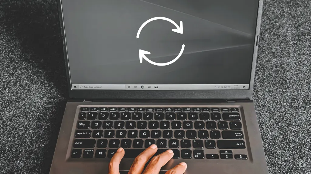 Person restarting ASUS laptop