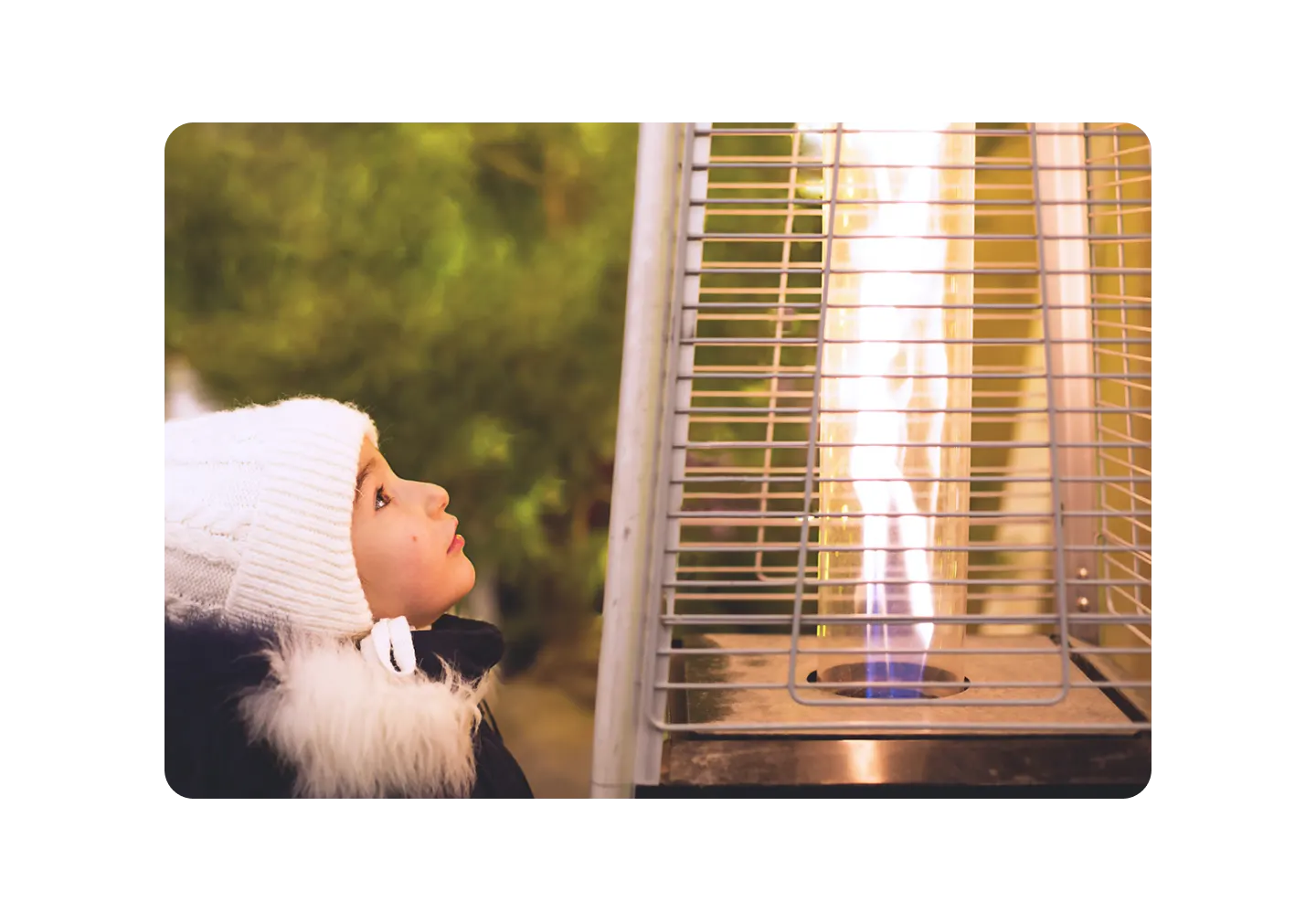 Child looking at a heater