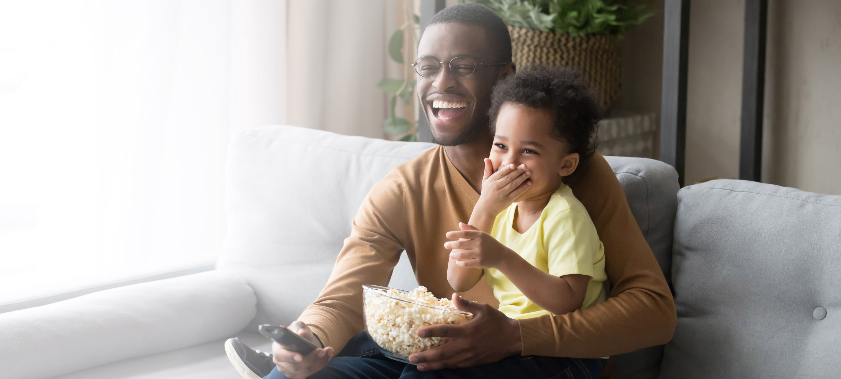 dad and son watching TV